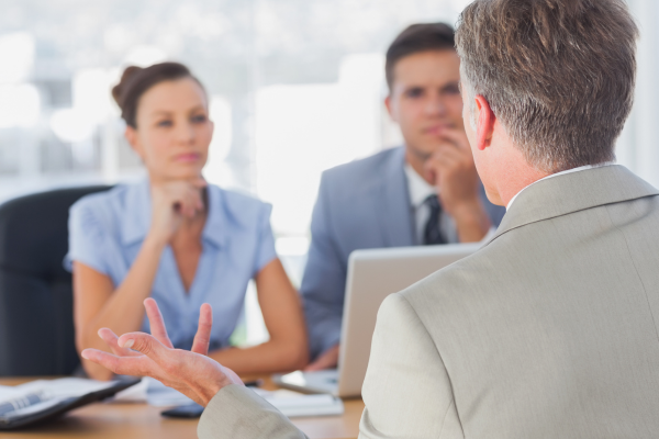 Interviewer interviewing a whistleblower or witness